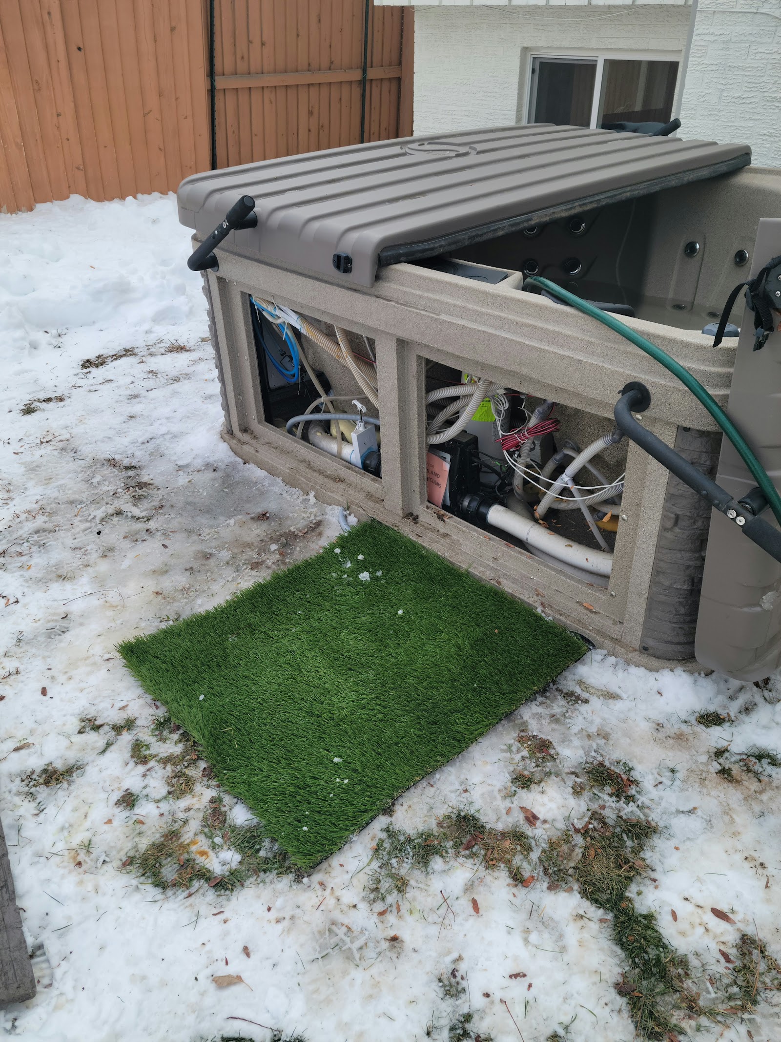 Hot tub cabinet opened for repair work